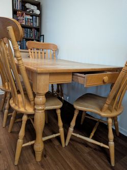 Wooden dining table with 4 chairs