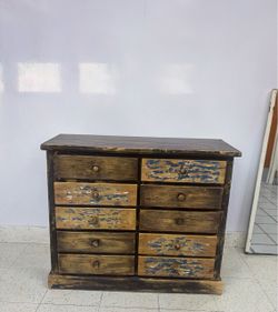 Unique apothecary style storage chest with 10 drawers