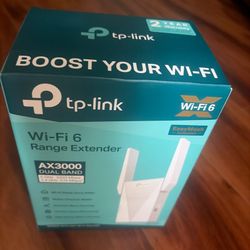 TP-Link AX3000 WiFi 6 Range Extender Internet Booster (RE700X) - Unused