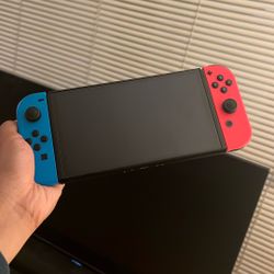 Switch OLED (comes with the Dock) Good As New!!