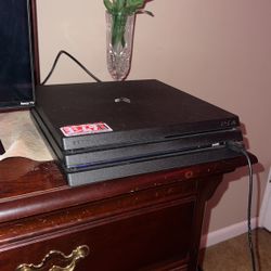 PS4 Pro W/ 2 Controllers and Headphones 
