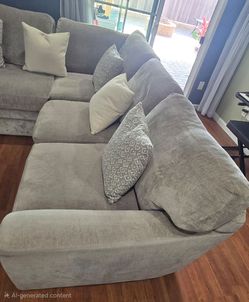 Grey three (3) or four (4) piece sectional sofa
Livingspaces