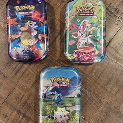 Pokemon Ascended Heroes Mini Tin - Totodile/Togepi Art, Scarlet Violet Prismatic Evolutions Sylveon Tin, Mega Evolution Heroes kangaskhan.