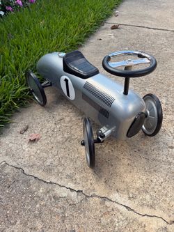 Friendswood, Texas, children toddlers ride on toy balance bicycle