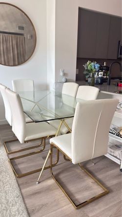 West Elm Gold Glass Dining Table and White Dining Chairs