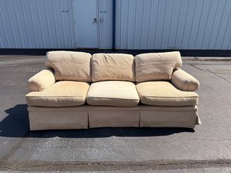 Beige 3-Cushion Upholstered Sofa with Skirt
