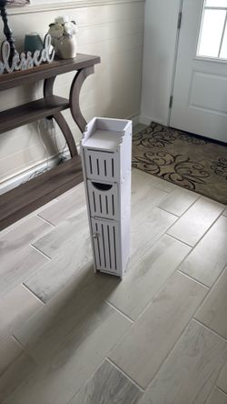 Bathroom cabinet toilet paper holder