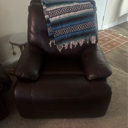 Brown leather recliner.