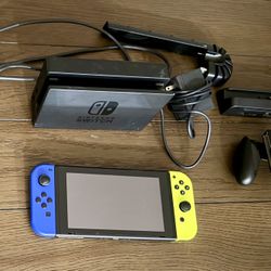 Nintendo Switch + Accessories 