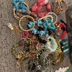 28 bracelets three necklaces