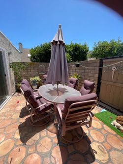 Table 6 chairs chaise lounge umbrella