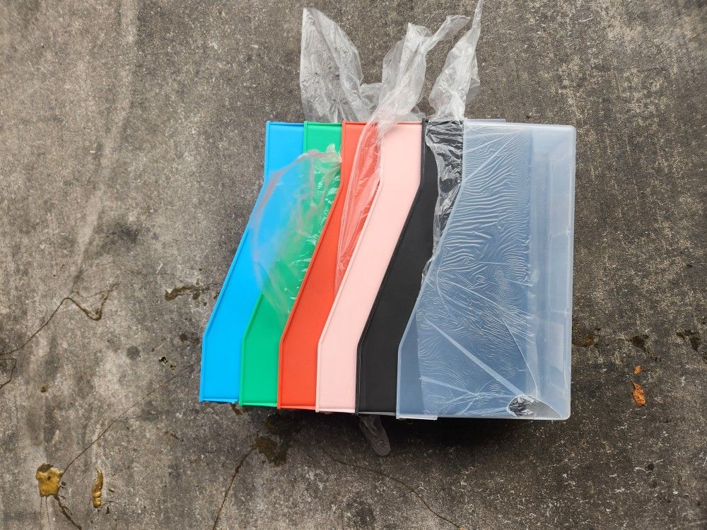 Five multicolored craft caddies