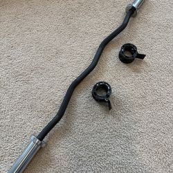 Synergee commercial EZ Curl Olympic barbell with locking collars