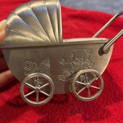 Baby Bank    Looks like Buggy With Wheels