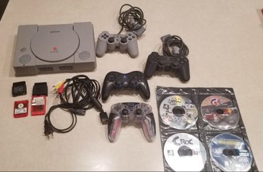 Original PlayStation! 4 controllers, 4 memory cards, 9 games