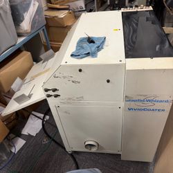 Graphic Whizard VividCoater, a machine used for applying ultraviolet (uv )