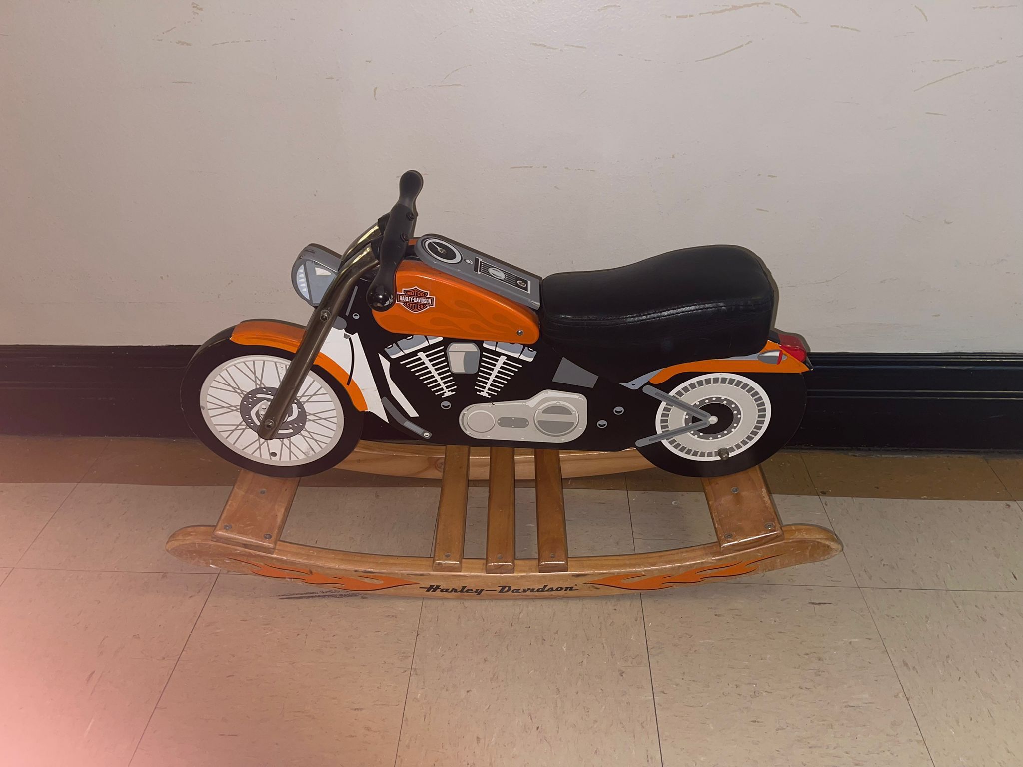 This is a Charm Company Harley-Davidson Roaring Softail Rocker, a children's rocking toy designed to resemble a Harley-Davidson motorcycle. It is made