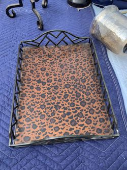 2 cheetah print trays and 3 cut glass vases