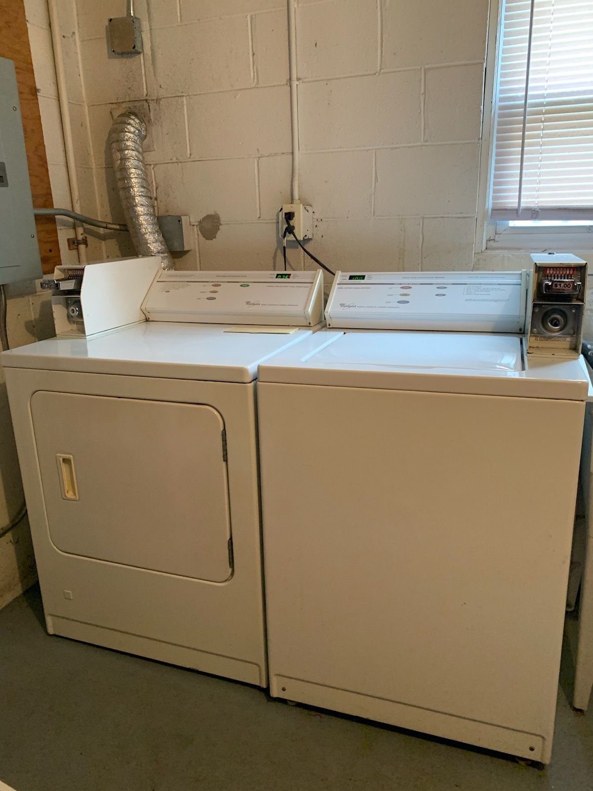 Whirlpool coin operated washer and dryer with keys.