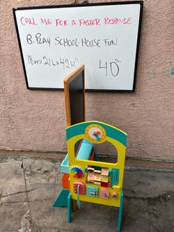 B. Play Schoolhouse Fun Wooden Activity Center