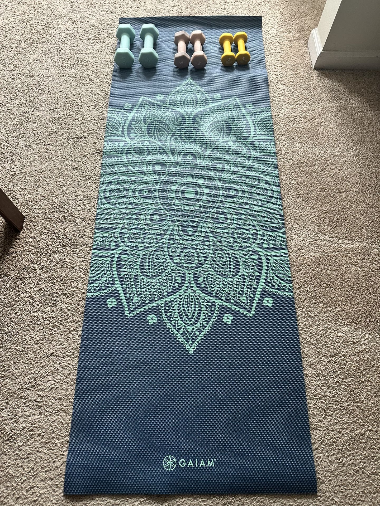Yoga mat with dumbbell sets