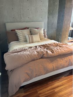 Upholstered Queen bed frame with slatted base