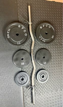 48 inches Steel Standard Barbell W/Weight Plates: 25s, 10s and 5s ponders. 93 # Brute W.