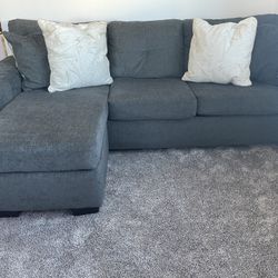 Macys dark gray sectional $700