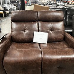 Brown leather loveseat recliner