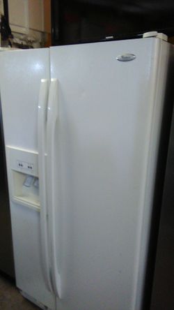 White Whirlpool sxs fridge one year warranty covers parts and labor delivery available