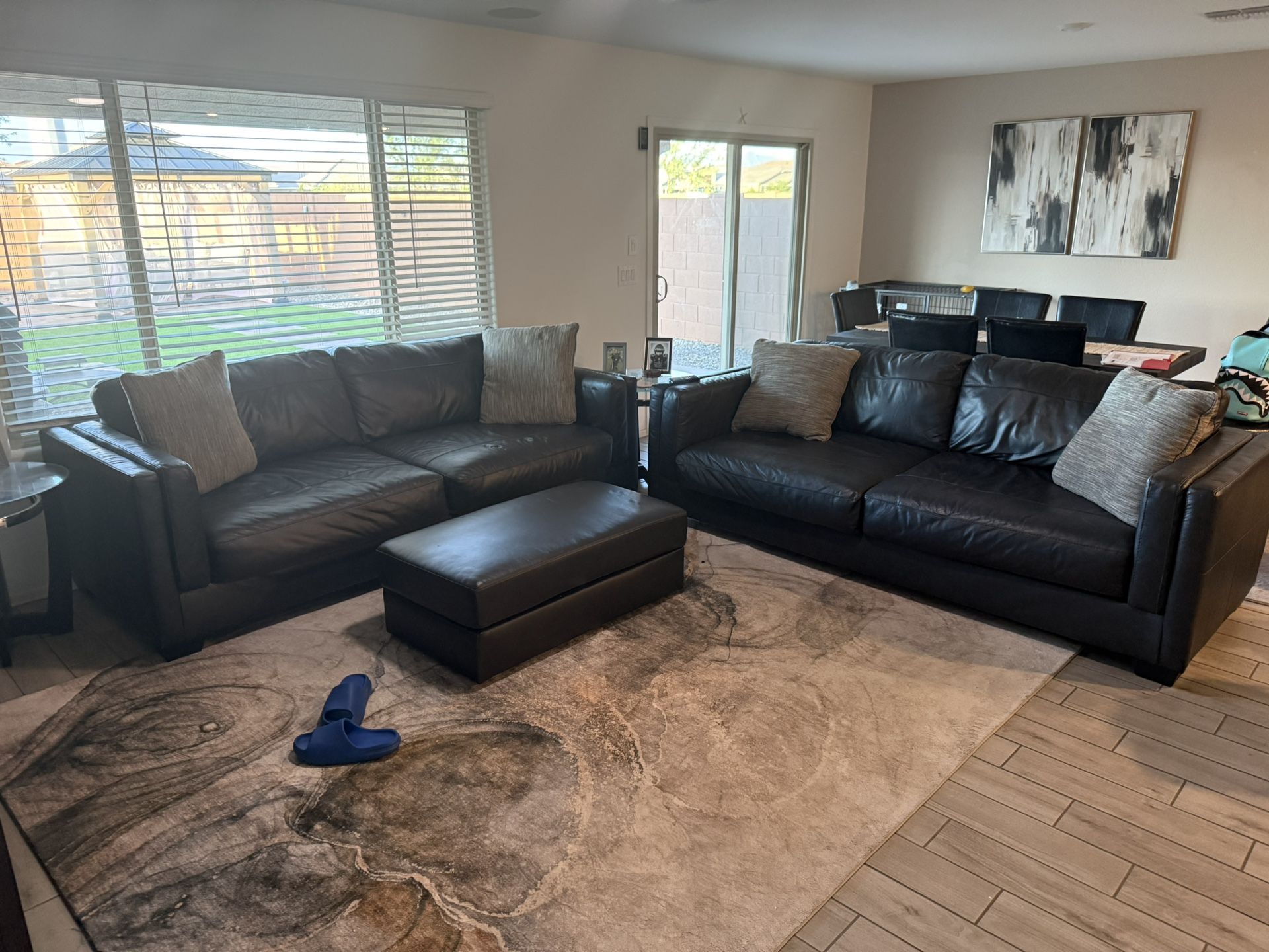 2 Leather Couches with Ottoman by Ashley Furniture