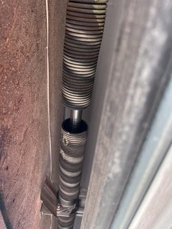 GARAGE DOORS SPRINGS AND INSTALLS