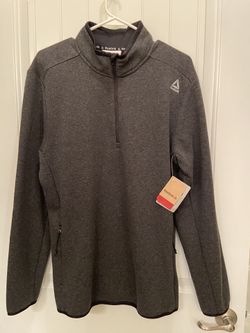 Men’s Reebok fleecy pullover size is medium