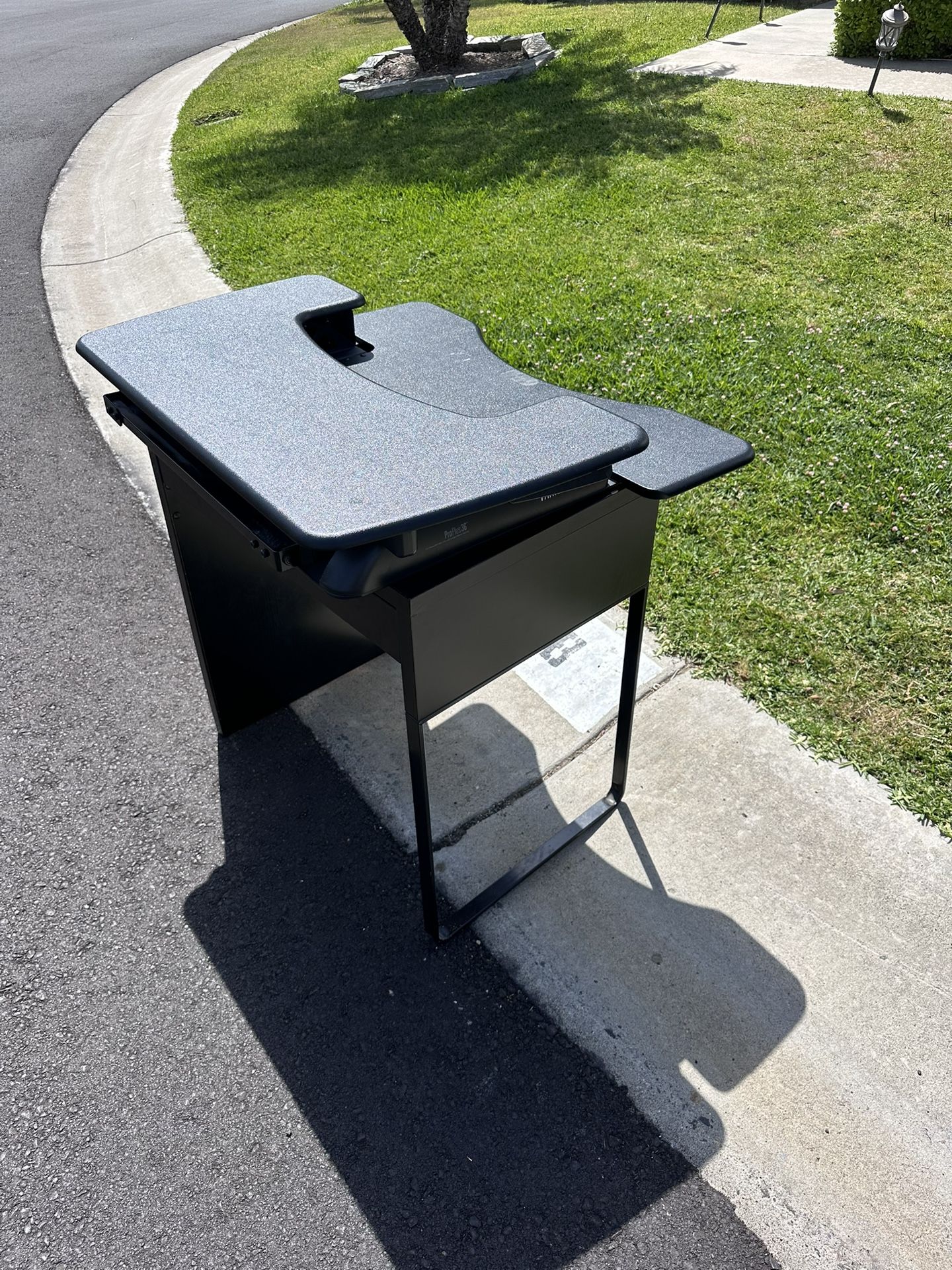 Free Adjustable Standing Table.