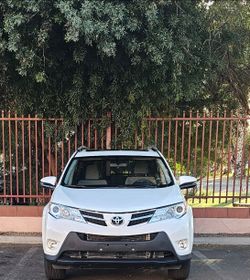 “For Sale: 2014 Toyota RAV4 XLE with 74,000 miles. Salvage title due to front bumper replacement—no frame damage, no airbags deployed. Everything is p