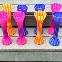 Eight plastic goblets