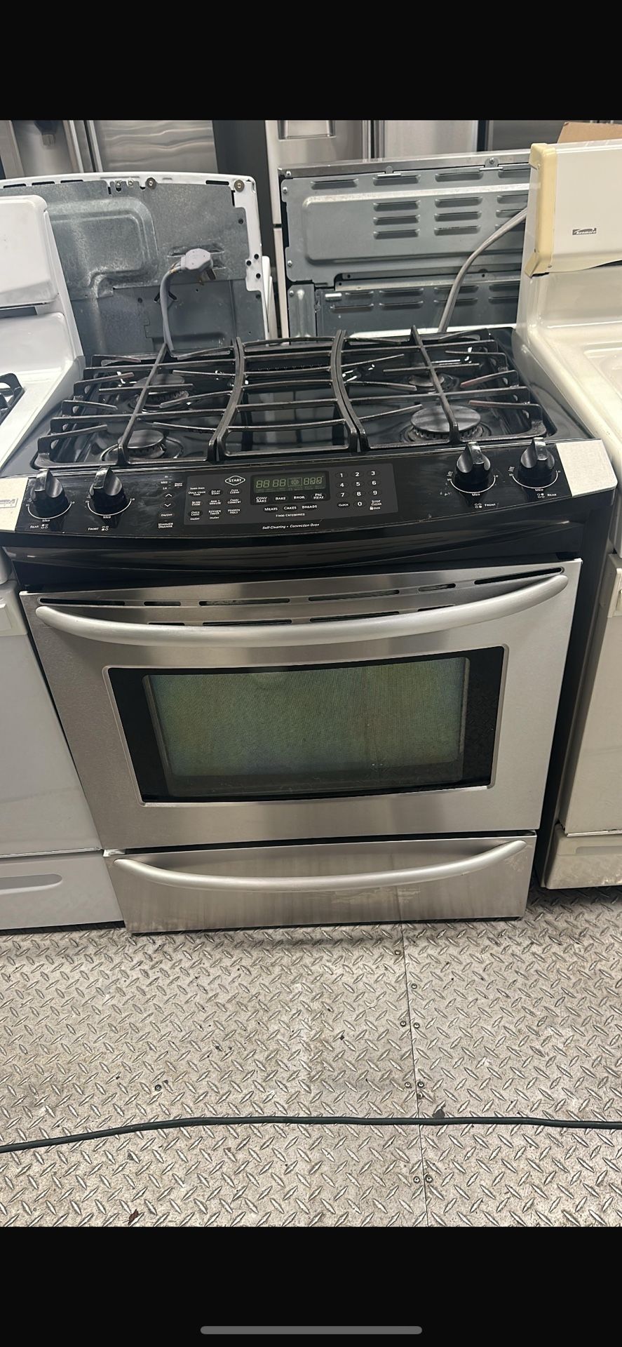 Kenmore Elite 30” Slide In Black And Stainless Steel Gas Stove With Convention Oven And A Warming Drawer