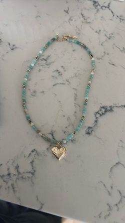 Calcite gemstone necklace with heart pendant