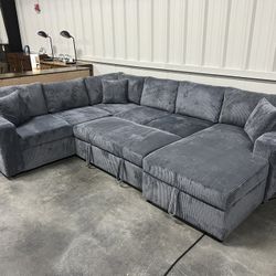 Sectional With Pullout Bed And Storage Chaise 