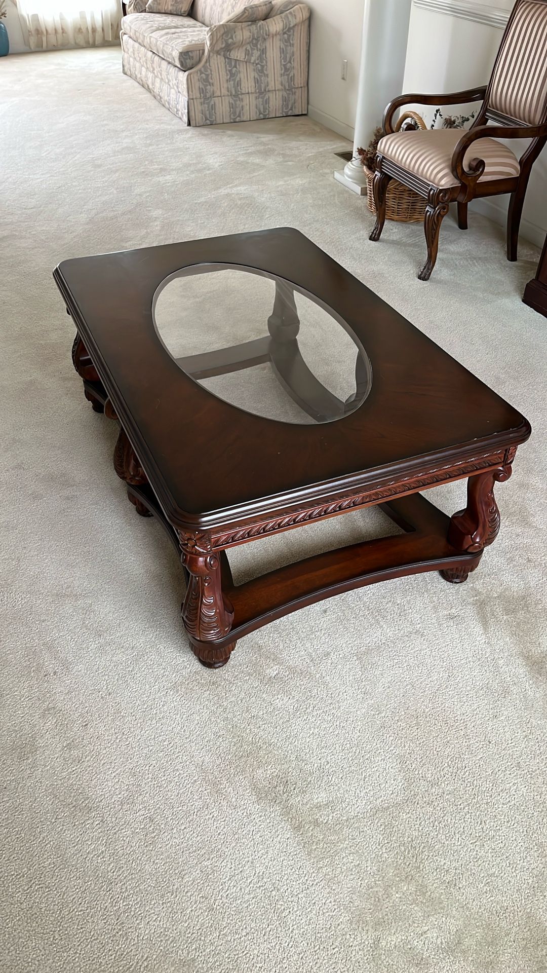 Carved ornate coffee table with acrylic replacement, top shatter resistant for children and pets