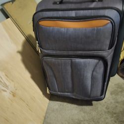 Protégé 4 Wheel Roll Around Suitcase