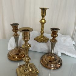 4 Polished Brass Candlesticks 