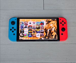 Nintendo Switch OLED 150 Games + 8000 Retros + Movies
