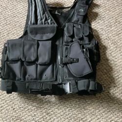 Tactical Vest. AR Rifle Slots. Handgun Holster. Extra Clip Pockets. Very Light Weight And Versatile. 