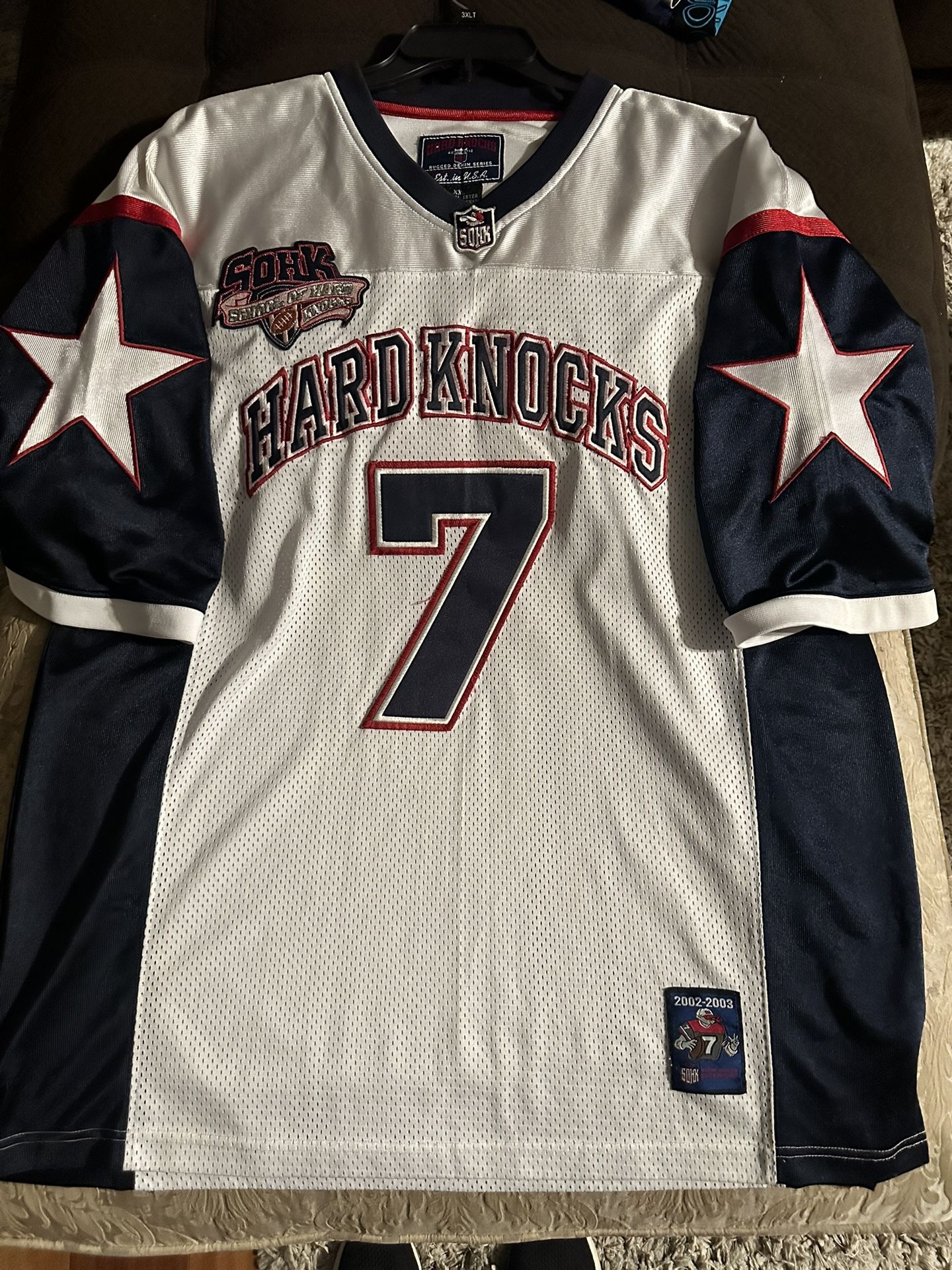 vintage SOHK (School of Hard Knocks) #7 football jersey from the 2002-2003 era