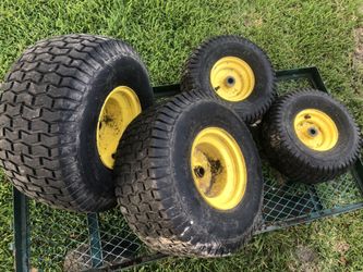 John Deere riding mower tires in good condition