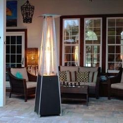 2403c $280  Resort Model 49,000 BTU NATURAL GAS Glass-Tube Flame Patio Heater in Rich-Mocha Matte Finish with Mobility Wheels and Protective Cover  Ne