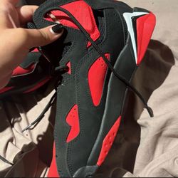 True flight black and red Jordan’s