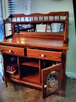 Dry bar, oak, perfect mirror is perfect. All the drawers and doors are perfect and work great