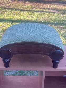 Vintage Arched Wood Upholstered Durable Fabric Footstool. Used in good condition with some cosmetic blemishes. These blemishes are in the form of scra